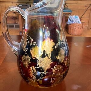 Elegant Handcrafted Glass Pitcher with Gold Leaf Design.